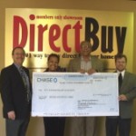 50K check presentation 042010 blog DirectBuy of New Orleans