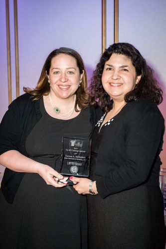 Theresa Barbadoro, of Baker, Braverman & Barbadoro, P.C., receives Excellence in the Law award from Massachusetts Lawyers Weekly Editor-in-Chief Susan Bocamazo.