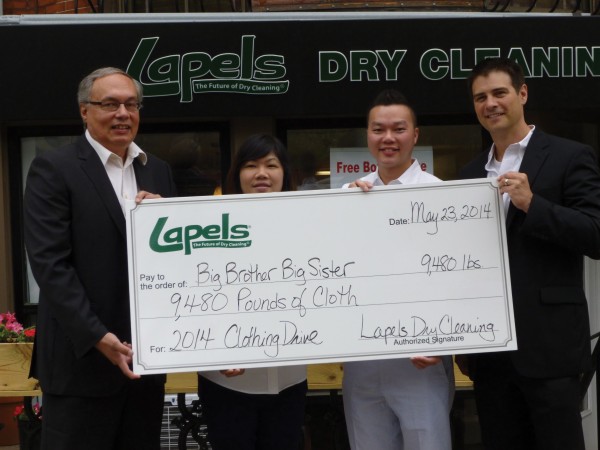 (L-R) Steve Beck, Big Brother Big Sister Foundation, May Situ and Bao Chen, owners of Lapels South End, and Kevin Dubois, CEO of Lapels Dry Cleaning. 