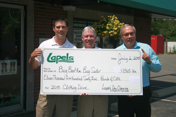 (l-r) Kevin Dubois, CEO of Lapels Dry Cleaning, Rich Delbou, manager of Lapels Dry Cleaning of Cohasset, MA, Steve Beck, executive director Big Brother Big Sister Foundation. 