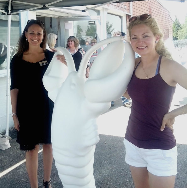 Nicole Long, Assistant Executive Director at OCES and local artist Samantha Shields were on hand to watch the lobsters as they were "released" from their trailer on the Plymouth Waterfront on July 15th 