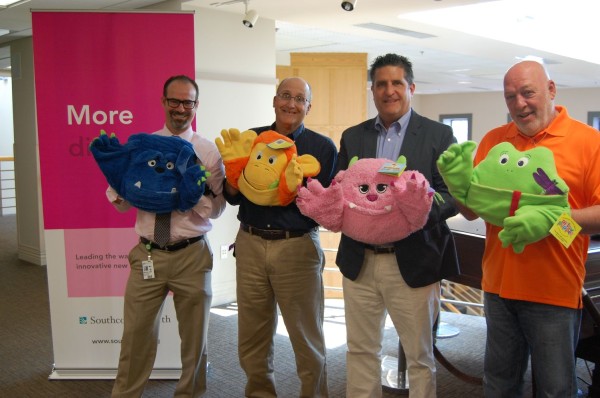 :  South Coast Improvement, Co. Vice-President Sean Whalen (third from left) recently donated 25 pillow puppets to the children at Southcoast Hospital’s pediatric ward as part of their Radiothon 2014. Also pictured are (l-r) Dr. Brian Sard, Pete Braley and Jim Casey from Southcoast Hospitals. 