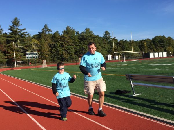 Furnace Brook Middle School Principal, Patrick Sullivan, with his son Cooper at the “I Am...Not Alone. We’re in this Together” Blindfold Run/Walk. 