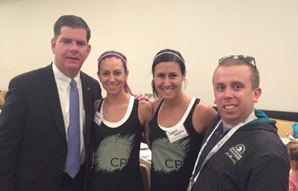 John Shea, producer at Talking Information Center reading service for the visually impaired (right) with Boston Mayor Martin Walsh and runners Sarah Dever and her sighted guide Sammie Nunziata of Team With A Vision during Massachusetts Association for the Blind and Visually Impaired Volunteer Appreciation Brunch. 