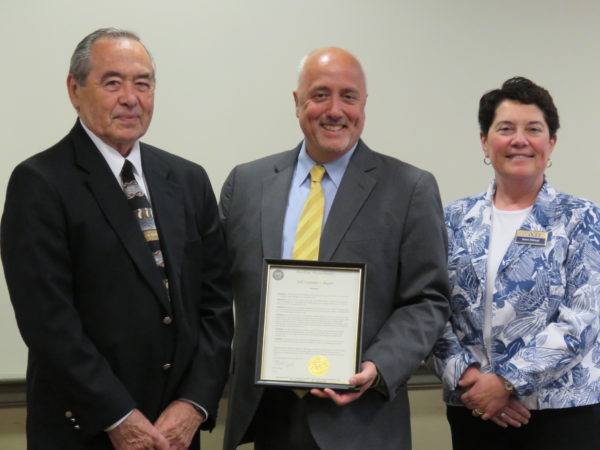 OCES Board President Ted Lang, Mayor Bill Carpenter and Diana DiGiorgi, Executive Director of OCES